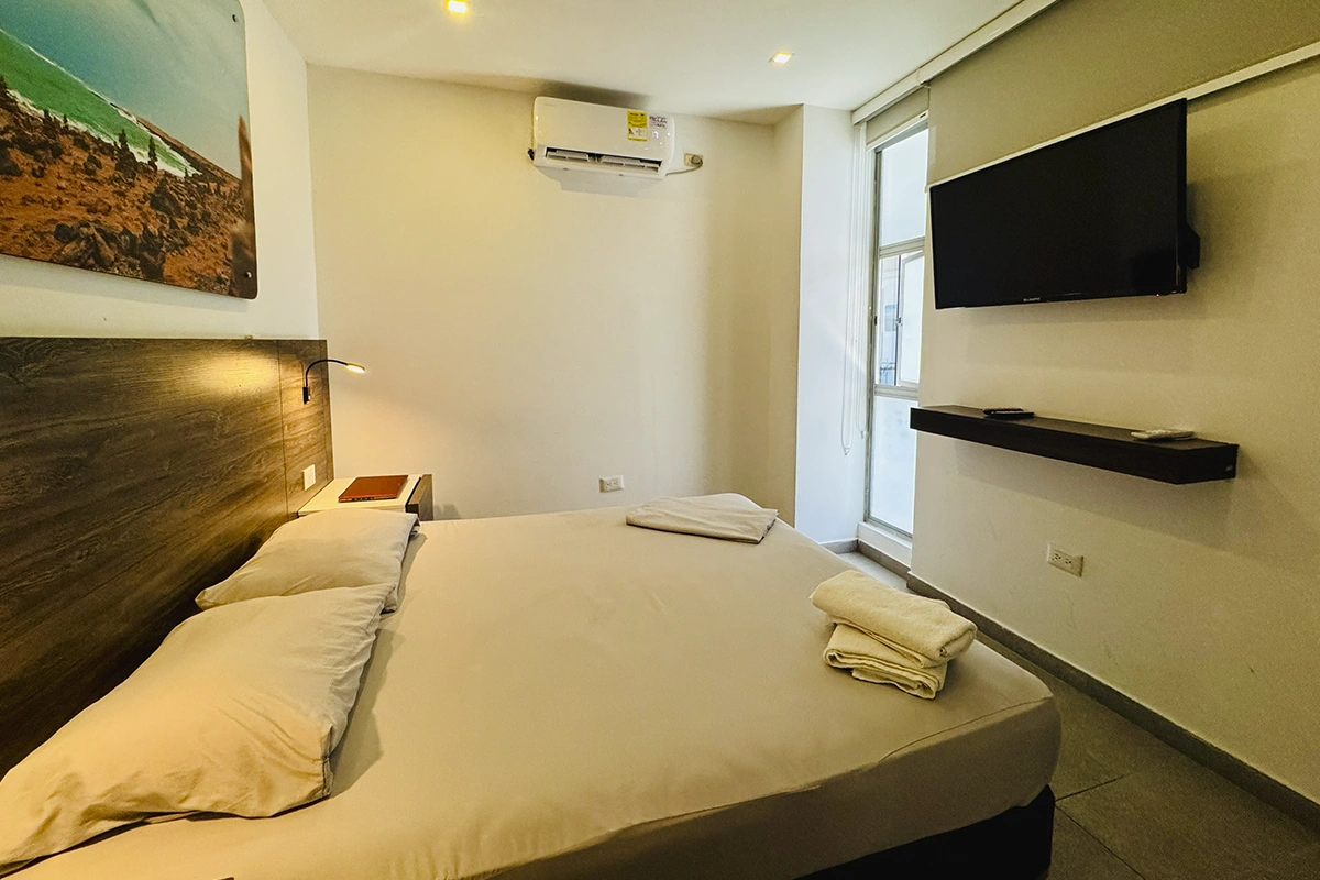 habitacion con cama doble queen 208 laguna sala