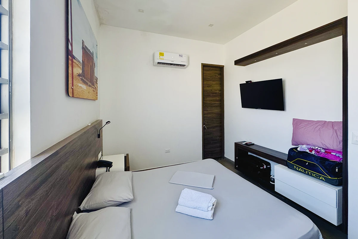 habitacion doble cama queen laguna sala