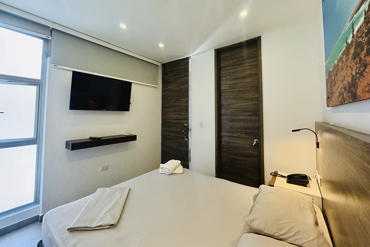 habitacion estandar con cama doble queen 208 laguna sala